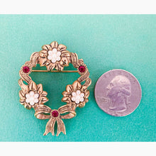 Load image into Gallery viewer, Avon 1994 Rose Wreath Pin - Antiqued Gold-Tone with Red Crystals &amp; White Flowers
