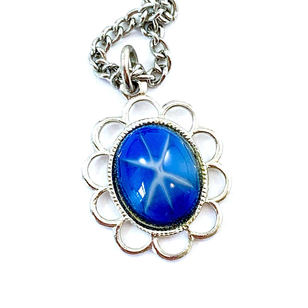 Delicate Simulated Blue-Star Sapphire Pendant in Silver-Tone Oval Setting